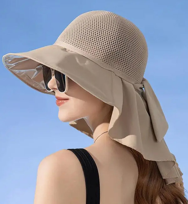 Beige wide-brimmed sun hat with neck flap for extra protection