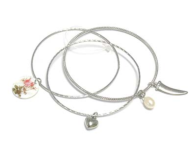 Three bangle with shell disk and multi charm bracelet