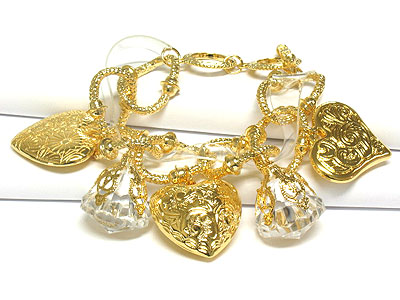 Rock crystal lucite charm and multi filigree heart charm dangle bracelet - nude fashion trend