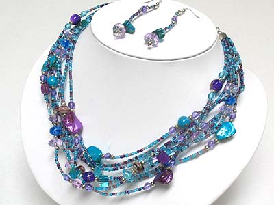 Multi strand seed beads and shell neckalce and earring set