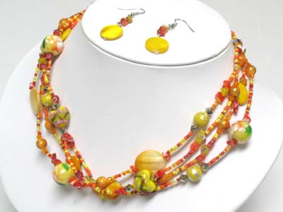 Multi strand seed beads and shell neckalce and earring set