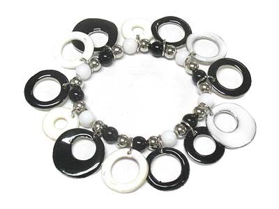 Epoxy cover shell and metal donut charms stretch bracelet 