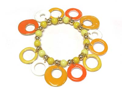 Epoxy cover shell and metal donut charms stretch bracelet