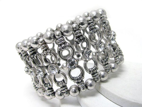 Architectural crystal deco metal bar and ball link wide stretch bracelet