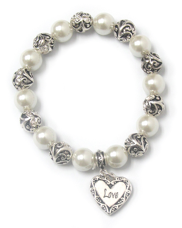 Heart charm and metal filigree ball and pearl stretch bracelet - love