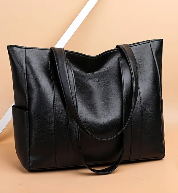 Large black leather tote bag with long handles