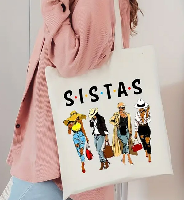White tote bag with stylish 'sistas' illustration print