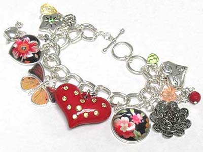 Antique style flower heart and butterfly charm braceelt