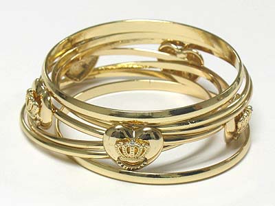 Crown accent seven row metal bangle