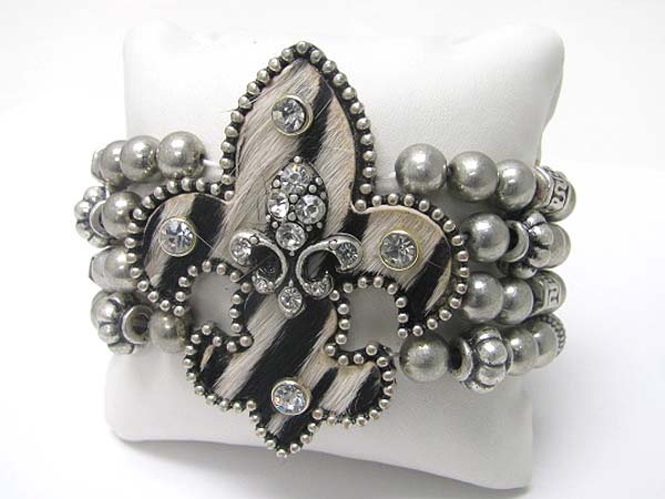 Crystal stud fleur de lis top multi row metal stretch bracelet