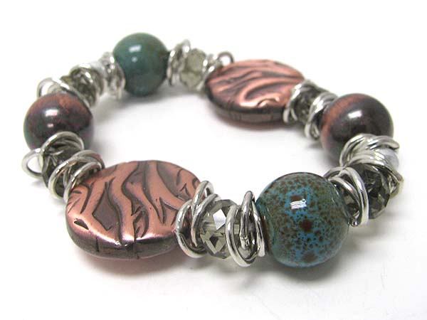 Ceramic ball and mixed metal disk link stretch bracelet