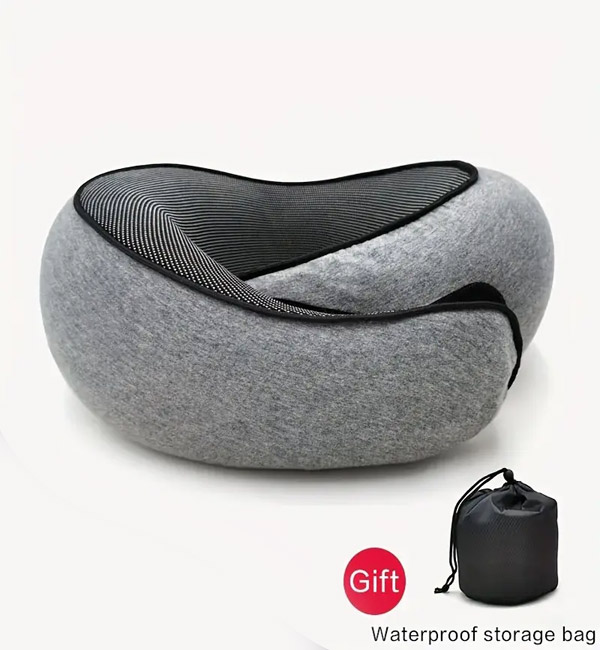 Gray memory foam travel pillow with storage bag