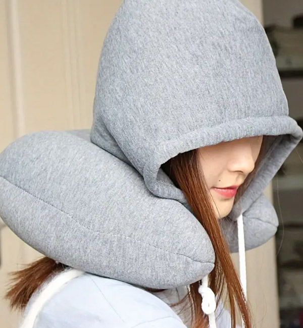 Hooded travel neck pillow for comfortable rest