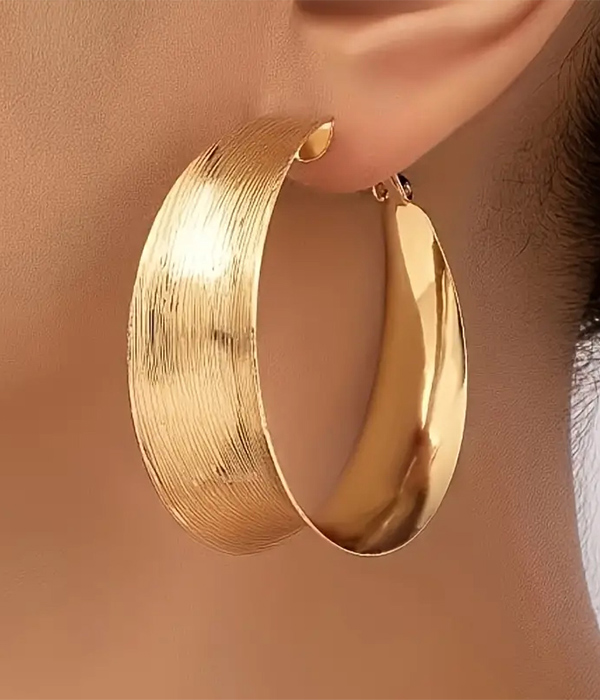 Wide metal hoop earring
