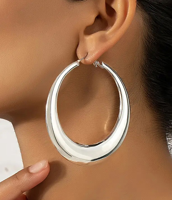 Puffy metal hoop earring