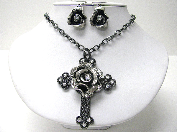 Crystal center metal rose and cross necklace earring set