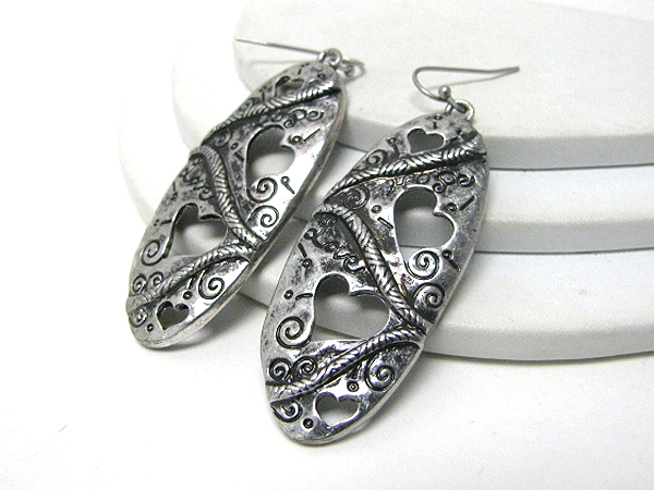 Textured metal art stick earring