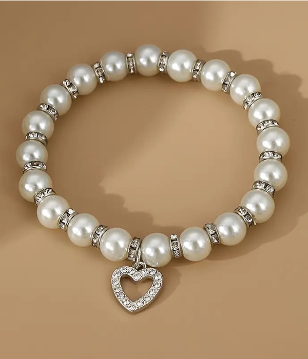 Heart pendant and faux pearl stretch bracelet
