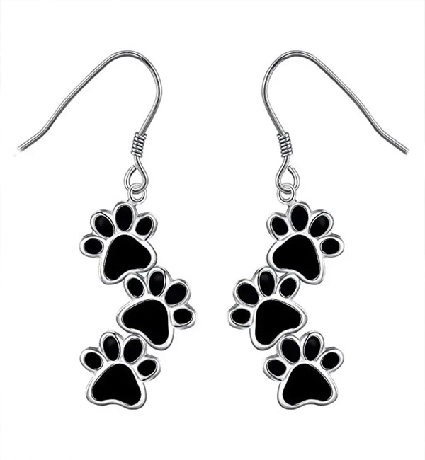 Black paw print earrings with silver outlines