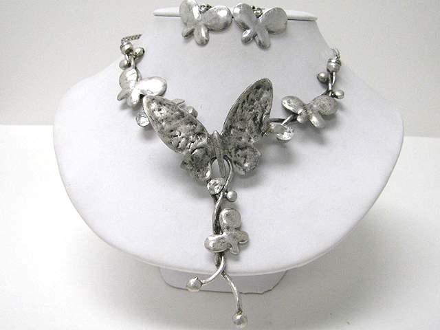 Crystal and hammered metal butterfly link neckace earring set