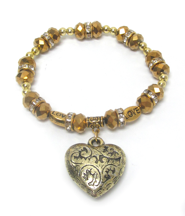 Facet bead and puffy heart charm stretch bracelet