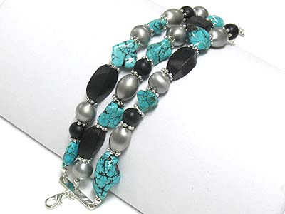 Turquoise stone and wooden beads tri row bracelet