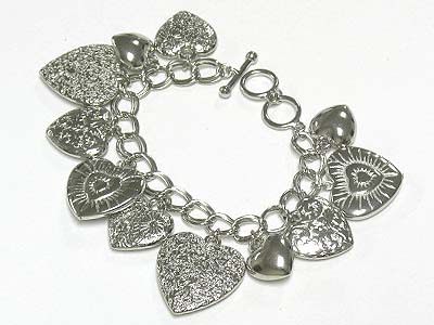 Multi metal filigree heart charm dangle toggle bracelet