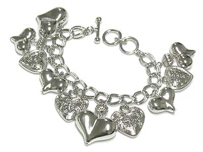 Multi metal puffy heart charm dangle toggle bracelet