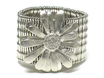 Crystal centered  scratch metal flower wide stretch bracelet - brass metal