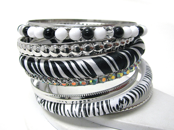 Crystal and multi material stackable animail print bangle set of 7