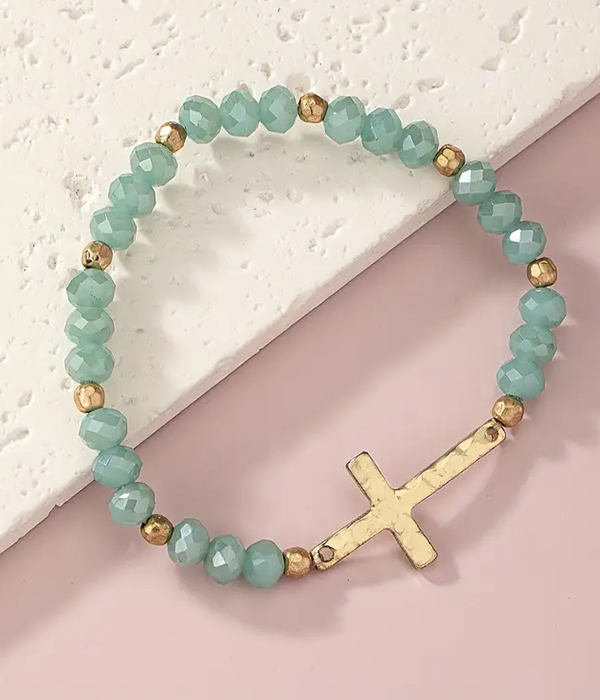 Cross pendant and facet bead stretch bracelet