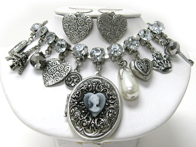 Retro vintage style locket and mixed charm with crystal accent necklace earring set