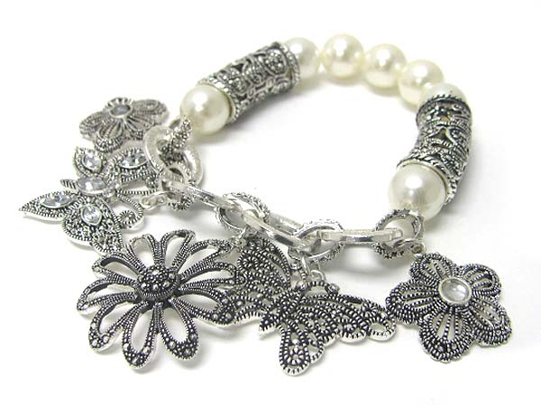 Marcasite look texture multi butterfly and flower charm stretch bracelet