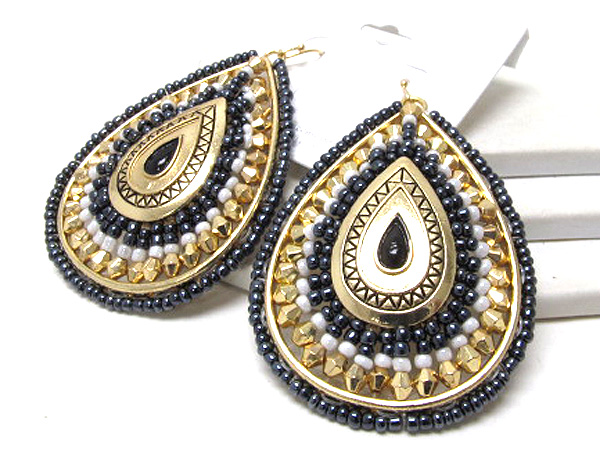 Multi ethnic design seed bead and oval small metal on tear drop earring