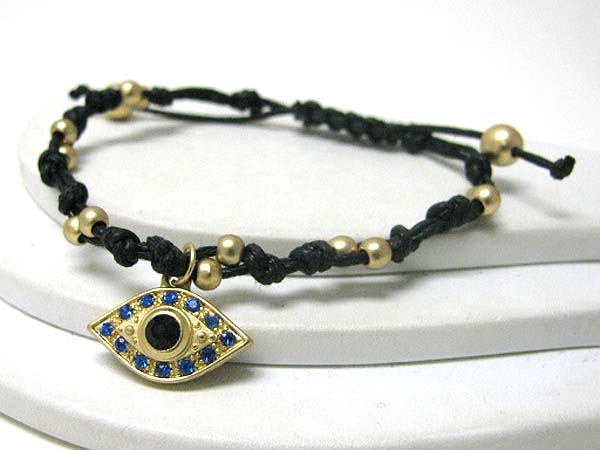 Crystal deco evil eye charm and corded sliding knot bracelet