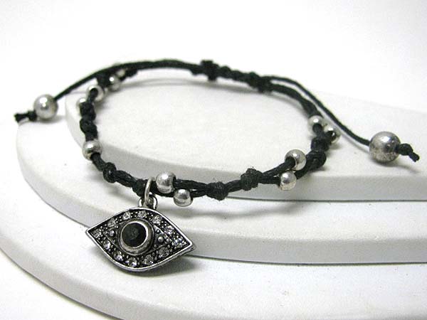 Crystal deco evil eye charm and corded sliding knot bracelet