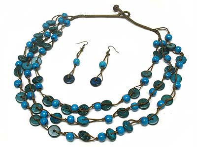 Multi strand wood donut and bead necklace and earring set 