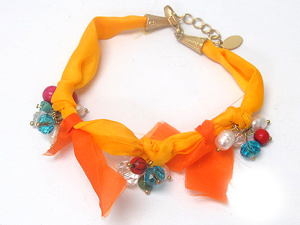 Multi crystal glass and pearl patern and fashion colorful tied fabric on chain bracelet