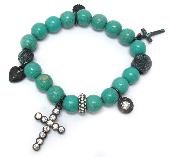 Crystal patina cross and turquoise ball link stretch bracelet