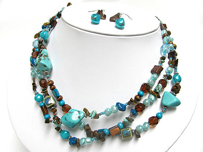 Multi strand turquoise and natural chip stone necklace and earring set