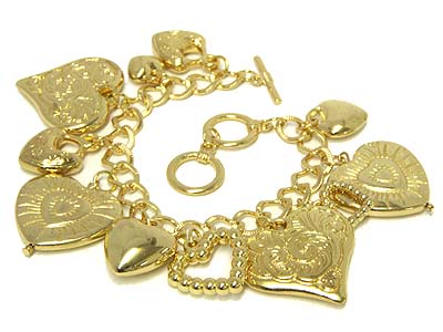 Multi casting heart charm toggle bracelet