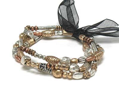 Tri tone antique metal beads triple row stretch bracelet