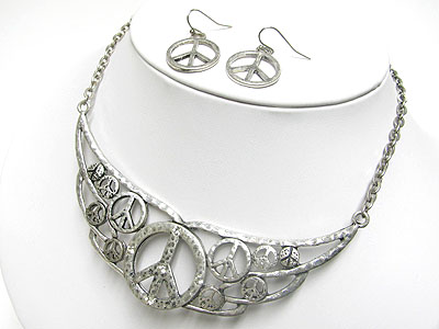 Burnish metal peace theme wing necklace and earring