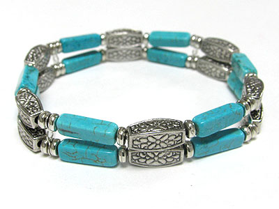 Double line turquoise and metal bar stretch braceelt