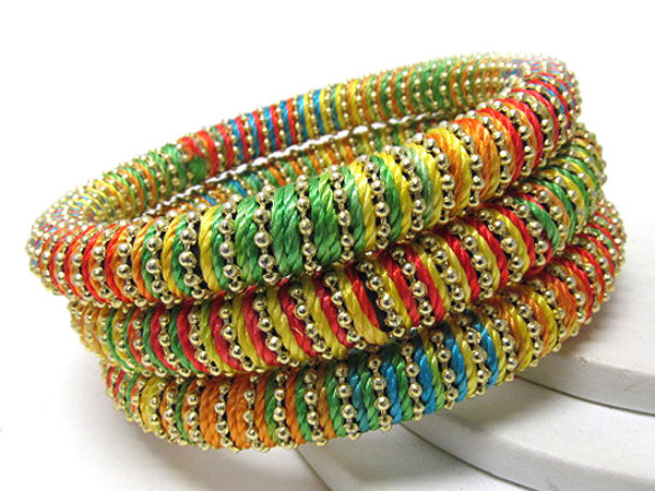 Multi row wood and small metal balls on fabric wrapped bangle set