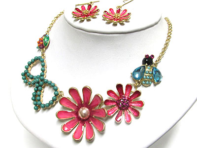 Crystal and seed beads doco bugs and flower link chain necklace and earring set