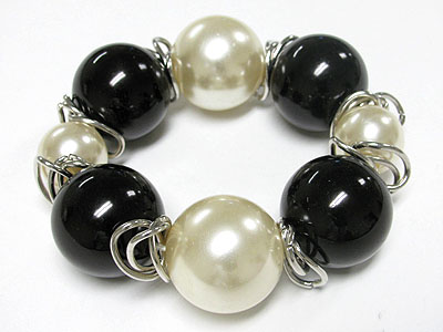 Large pearl ball twisted metal wrapped stretch braceelt