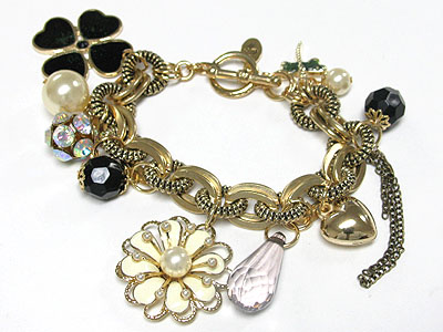 Antique style flower and crystal ball and multi charm dangle bracelet