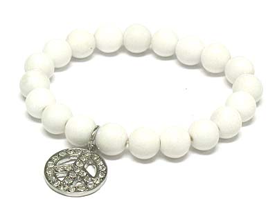 Crystal peace charm and pearl beads stretch bracelet 