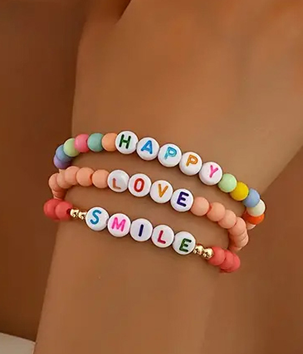 3 piece stackable seedbead stretch bracelet set - happy love smile
